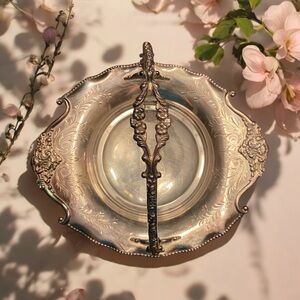 Antique Quadruple Silver Plate Basket with Handle and paw feet.